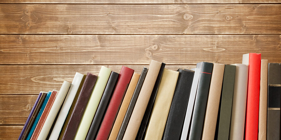 bigstock-Old-books-on-a-wooden-shelf-N-46537213